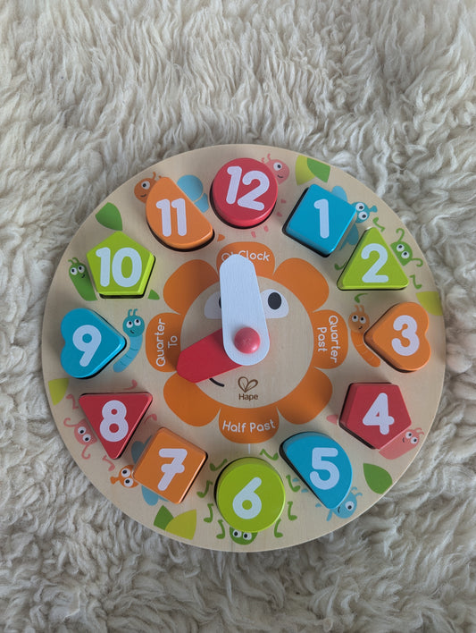 Klok en vormenpuzzel