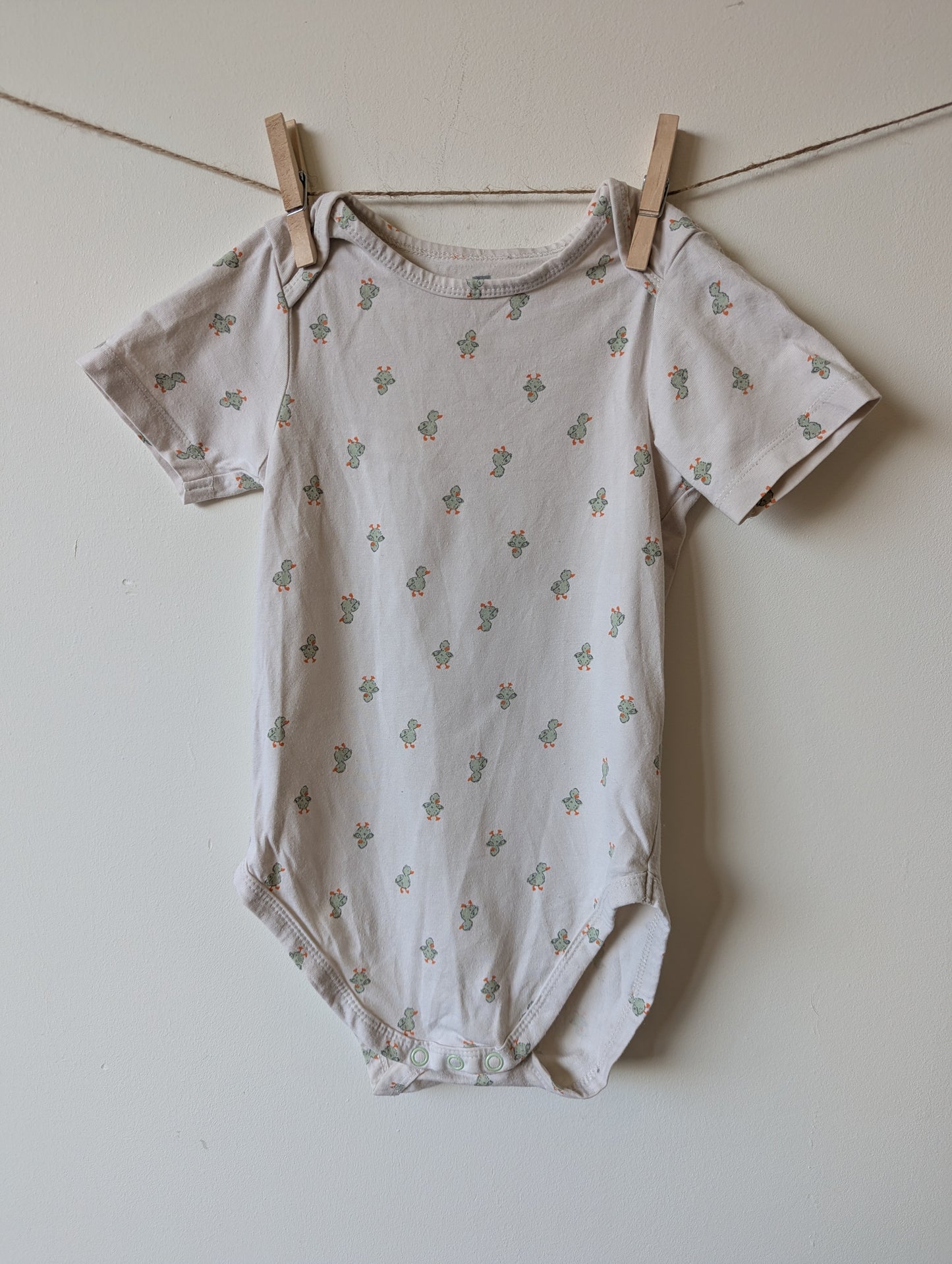 4 rompers (korte mouw) - mt 98/104